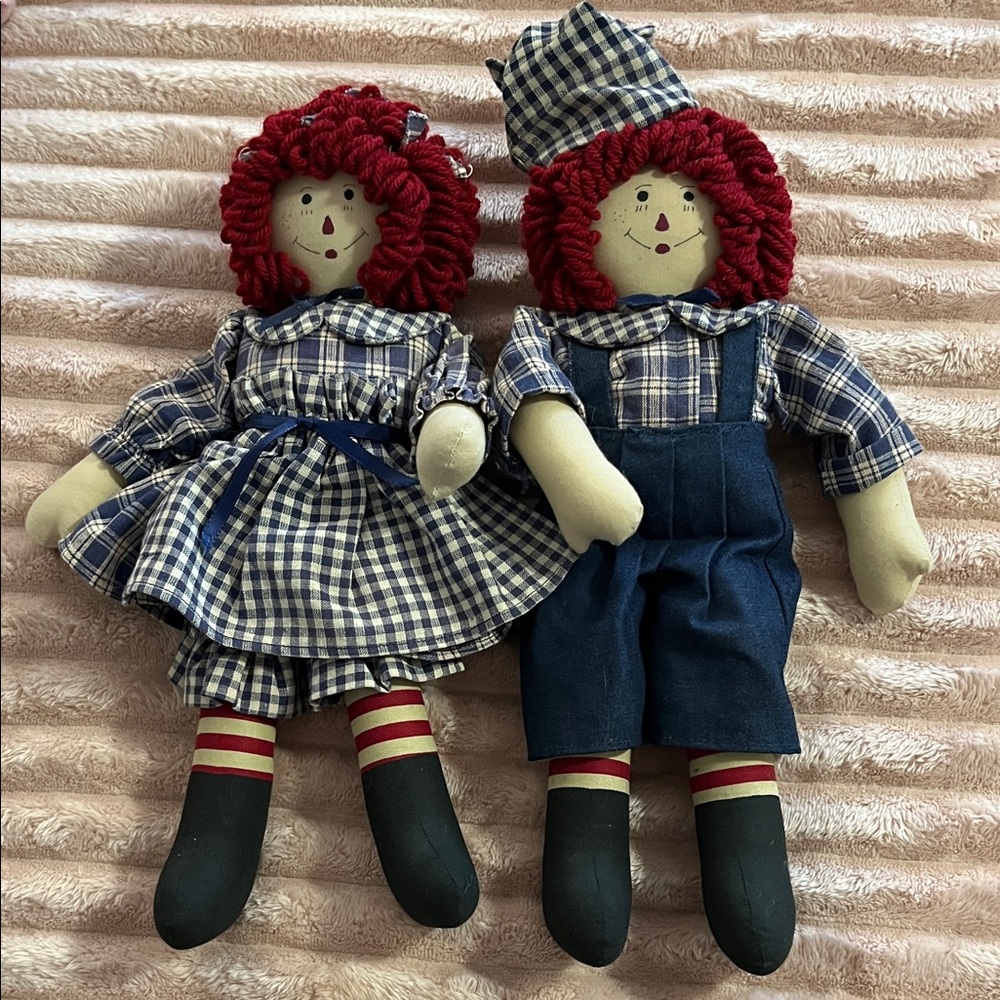 Raggedy Ann and Andy dolls. Matching outfits and lots of hair. Great quality!!!